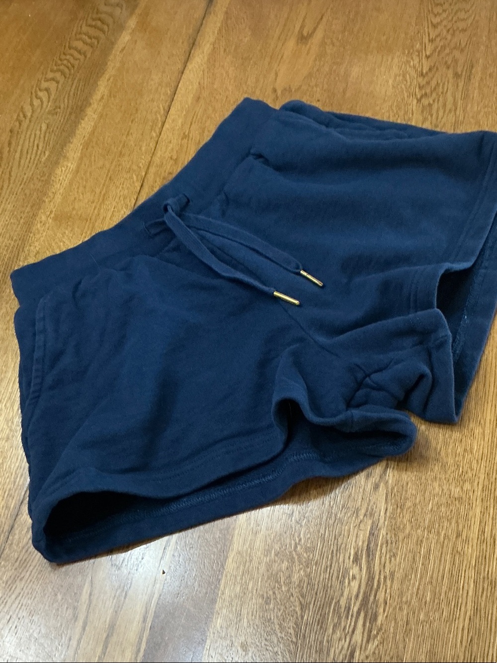 Woman’s WeWoreWhat knit pull on navy short. Small. Gently worn. Pockets. Cute!